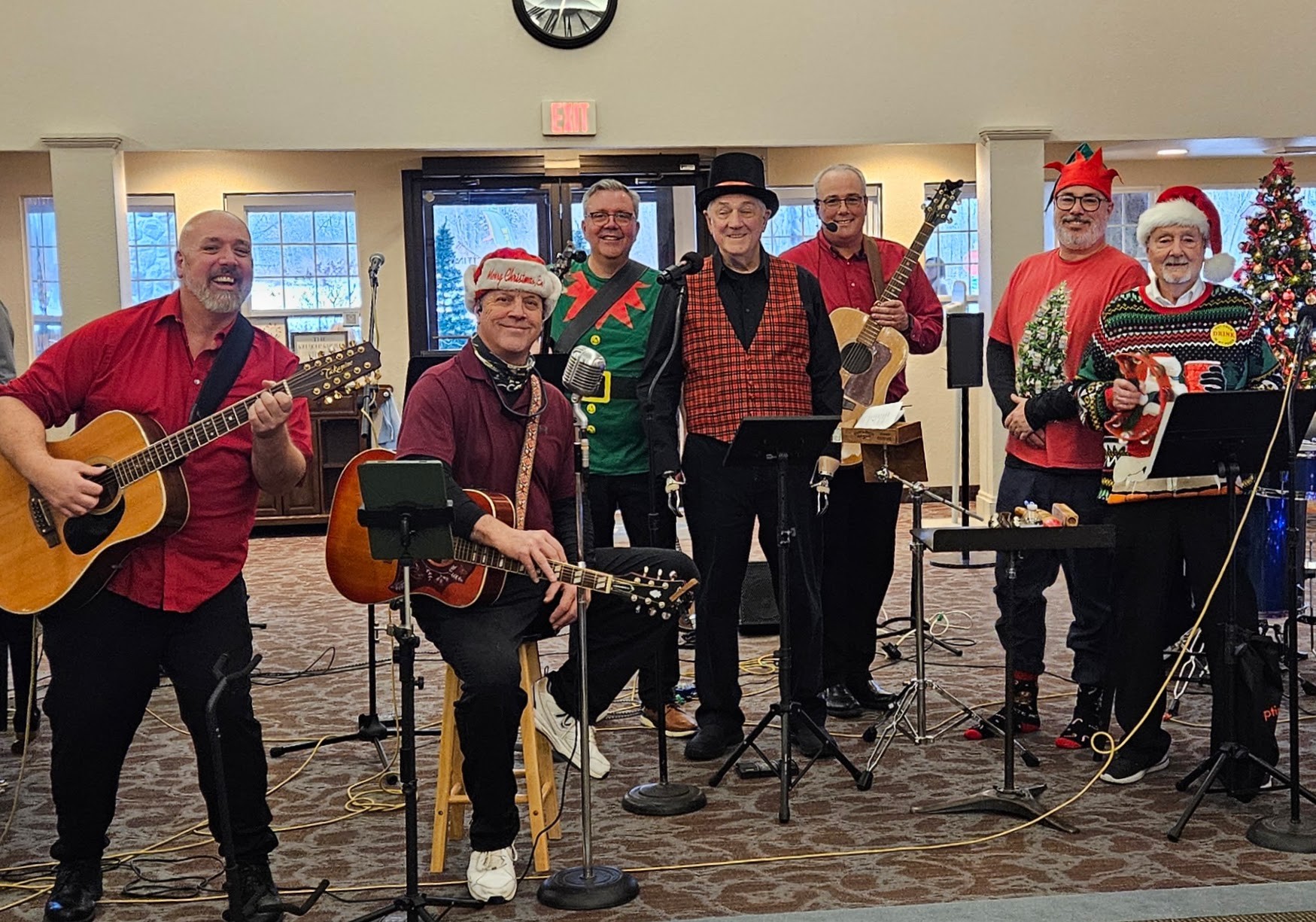 Special Blend performing a festive Christmas holiday concert in Santa hats and holiday sweaters